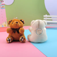 Porte-clés peluche ourson pailleté beige et son pompon camel - 54321 Porte-clés peluche ourson pailleté beige et son pompon camel - 54321
